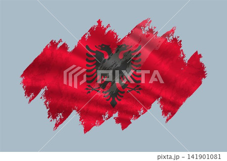 Albania flag is depicted with brushstrokes and features textured design elements. 141901081