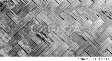Black and white woven bamboo textured surface Black and white woven bamboo textured surface 141901314