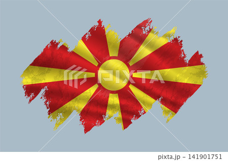 Macedonia flag is depicted with brushstrokes and features textured design elements. 141901751