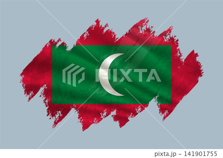 Maldives flag is depicted with brushstrokes and features textured design elements. 141901755