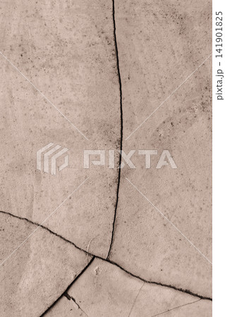 Cracked sepia colored concrete surface texture background 141901825