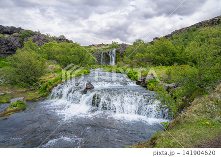 Beautiful waterfall in Gjain valley, Iceland Beautiful waterfall in Gjain valley, Iceland 141904620