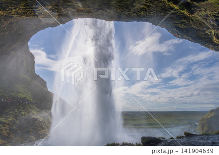 Seljalandsfoss Waterfall Behind View in Iceland Seljalandsfoss Waterfall Behind View in Iceland 141904639
