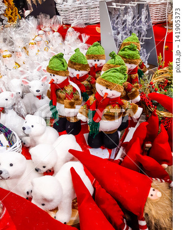 Christmas and New Year's toys on a shelf in a store. Festive winter Christmas trade 141905373