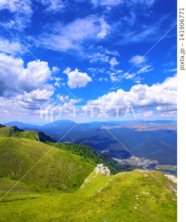 Aerial view of picturesque scenery in Carpathian mountains, Romania. A bird's-eye view of the enchanting mountain landscape. Beautiful landscape of Carpathian mountains, Europe Aerial view of picturesque scenery in Carpathian mountains, Romania. A bird's-eye view of the enchanting mountain landscape. Beautiful landscape of Carpathian mountains, Europe 141906771