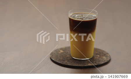 espresso with orange juice in a glass espresso with orange juice in a glass 141907669