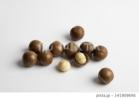 Macadamia nuts isolated on white background Macadamia nuts isolated on white background 141909698