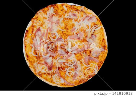 Pizza with ham and onion rings, cheese melting on crust Pizza with ham and onion rings, cheese melting on crust 141910918