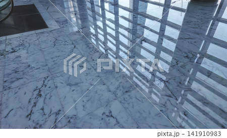 Hong Kong Aug 7 2026 skyscraper reflections on a polished marble floor 141910983