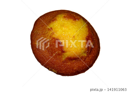 Single freshly baked golden ada cake isolated on a solid white background Single freshly baked golden ada cake isolated on a solid white background 141911063