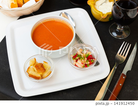 Tomato soup Gazpacho - traditional dish of Spanish cuisine closeup Tomato soup Gazpacho - traditional dish of Spanish cuisine closeup 141912450