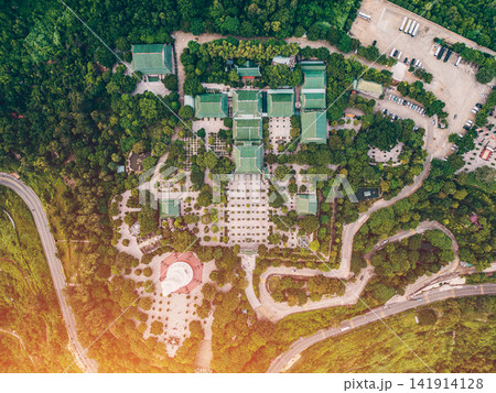 religious Lady Buddha monument at Linh Ung pagoda and buddhism temple in Danang, Asian religion and spirituality, Son Tra peninsula, Da Nang Vietnam, aerial drone view, directly above religious Lady Buddha monument at Linh Ung pagoda and buddhism temple in Danang, Asian religion and spirituality, Son Tra peninsula, Da Nang Vietnam, aerial drone view, directly above 141914128
