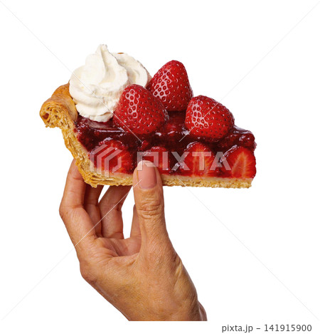 Hand holding a delicious slice of fresh strawberry pie garnished with whipped cream isolated on a clean transparent background for menu design and food advertising concepts Hand holding a delicious slice of fresh strawberry pie garnished with whipped cream isolated on a clean transparent background for menu design and food advertising concepts 141915900