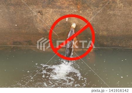 Water pollution in canal because industrial not treat water before drain. Water pollution in canal because industrial not treat water before drain. 141916142