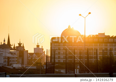 Antalya, Turkey, July 2026: Close-up view of a mosque minaret against the evening sky 141916279