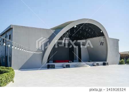Outdoor amphitheater stage under blue sky Outdoor amphitheater stage under blue sky 141916324