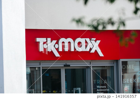 Corby, Northamptonshire, UK - August 2, 2026: TK Maxx store entrance and logo on the exterior of a retail store in Corby town centre, England. 141916357
