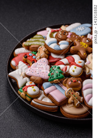 Gingerbread as a Christmas staple, sweets for the holiday interior. Gingerbread as a background 141918882
