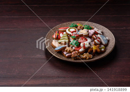 Gingerbread as a Christmas staple, sweets for the holiday interior. Gingerbread as a background 141918899