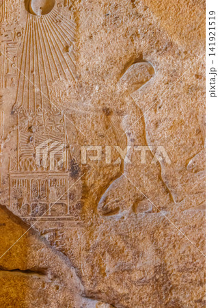 Ancient egyptian paintings and hieroglyphs carved on the stone wall Ancient egyptian paintings and hieroglyphs carved on the stone wall 141921519