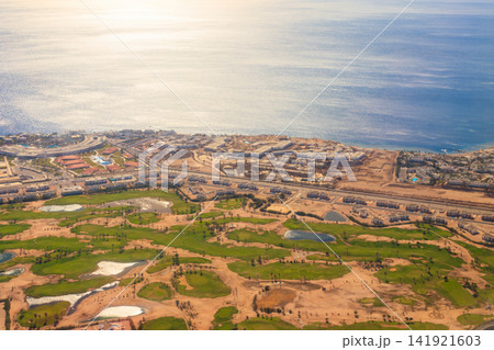 Aerial view on the Red sea and Sharm El Sheikh city, Egypt. View from airplane 141921603