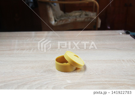 Plastic Box for Anti-Stress Toy on the Table. Lost Toys. 141922783
