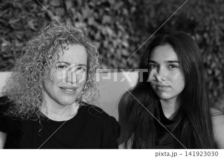 Mother and Daughter Portrait Sharing a Tender Family Moment Mother and Daughter Portrait Sharing a Tender Family Moment 141923030