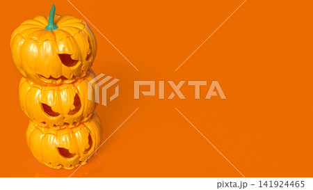 Stacked Scary Halloween Pumpkins on Bright Orange Background 3d render. 141924465