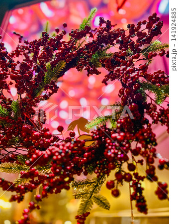 Red Christmas Berry Wreath with Soft Bokeh Background Red Christmas Berry Wreath with Soft Bokeh Background 141924885