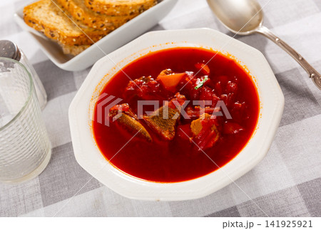 Traditional Ukrainian or Russian beetroot soup with beef 141925921