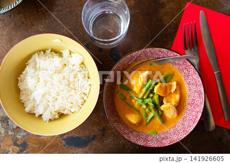 Portion of red curry chicken 141926605
