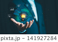 Businessman hand holding virtual cloud storage folder icon surrounded by business and data technology interface, cloud computing concept. 141927284
