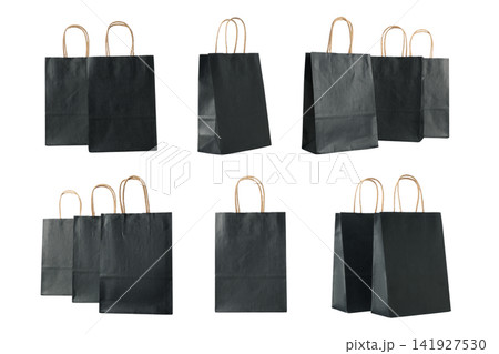 Black Friday. Variety of black shopping bags positioned creatively in dynamic arrangement, PNG Black Friday. Variety of black shopping bags positioned creatively in dynamic arrangement, PNG 141927530