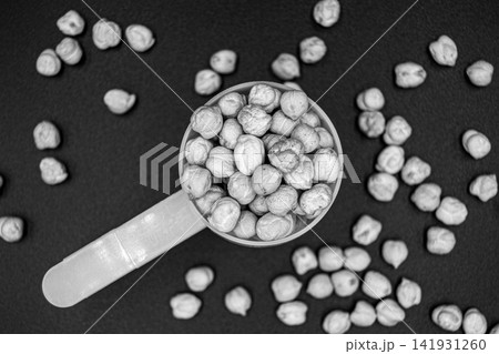 Beautiful organic dried chickpea beans consisting of raw bengal legume pea Beautiful organic dried chickpea beans consisting of raw bengal legume pea 141931260