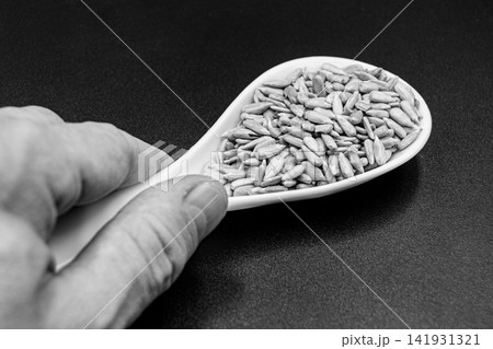 beautiful texture ripe of natural sunflower seeds on background beautiful texture ripe of natural sunflower seeds on background 141931321