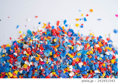 Plastic colorful pieces recycling shredded for industrial use. Plastic colorful pieces recycling shredded for industrial use. 141931543