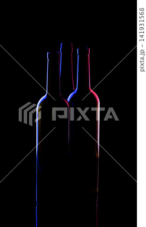 Still life with bottles on a black background 141931568
