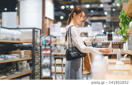 woman shopping facial skin care beauty product in retail store japanese business look fashion woman shopping facial skin care beauty product in retail store japanese business look fashion 141932852
