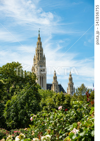 Neogothic tower and spires of Vienna City Hall against blue sky Neogothic tower and spires of Vienna City Hall against blue sky 141936755