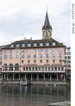 Scenic summer view of the Old Town architecture of Zurich with the bridge Untertorbryukke over Aare river, Zurich, Switzerland. High quality photo 141937240
