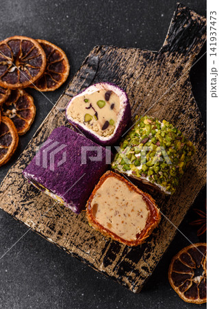 Turkish delight or lokum is a traditional Eastern sweet made with nuts. Turkish delight, lokum Turkish delight or lokum is a traditional Eastern sweet made with nuts. Turkish delight, lokum 141937473