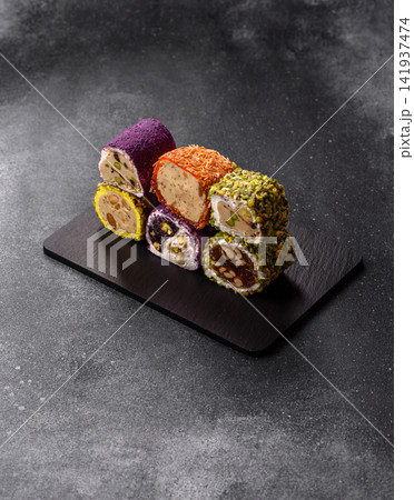 Turkish delight or lokum is a traditional Eastern sweet made with nuts. Turkish delight, lokum Turkish delight or lokum is a traditional Eastern sweet made with nuts. Turkish delight, lokum 141937474
