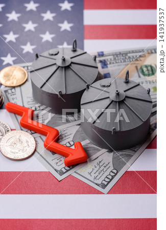 Liquefied gas storage tanks set against the USA flag as a background for your design 141937537