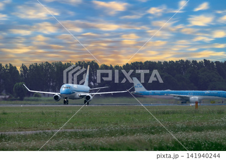 July 30, 2026. Netherlands, Amsterdam. KLM Passenger Plane on Runway at Schiphol Sunset July 30, 2026. Netherlands, Amsterdam. KLM Passenger Plane on Runway at Schiphol Sunset 141940244