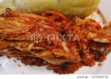 Kimchi with Boiled Potato Close-up Kimchi with Boiled Potato Close-up 141940559