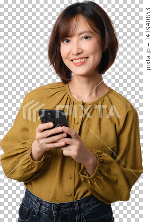 Asian woman smiling while holding smartphone in mustard blouse against transparent background for communication and lifestyle concept Asian woman smiling while holding smartphone in mustard blouse against transparent background for communication and lifestyle concept 141940853