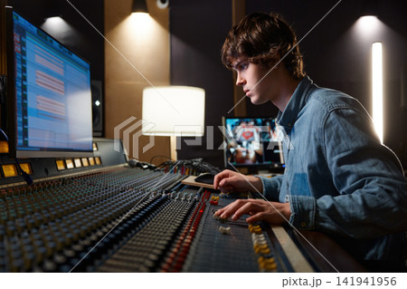 Ensuring precise level harmony and teamwork in highquality professional music studio Ensuring precise level harmony and teamwork in highquality professional music studio 141941956