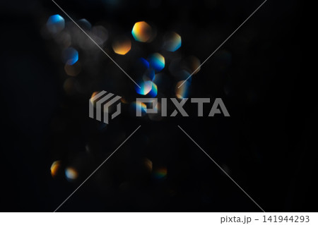 Elegant Sparkling Bokeh Lights on Dark Background. Luxury Festive Abstract Background.  141944293