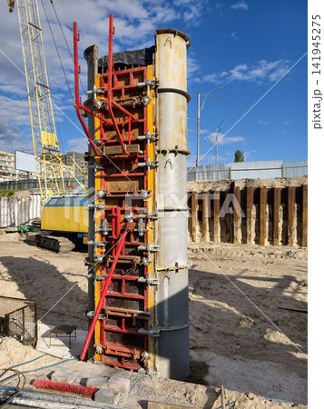Construction site with reinforced concrete bridge column work using adjustable formwork highlighting industrial engineering efficiency and structural reliability development Construction site with reinforced concrete bridge column work using adjustable formwork highlighting industrial engineering efficiency and structural reliability development 141945275