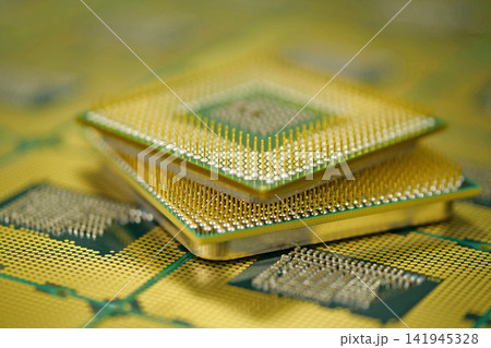 Central processing unit close up highlighting the intricate pin layout on the chip Central processing unit close up highlighting the intricate pin layout on the chip 141945328